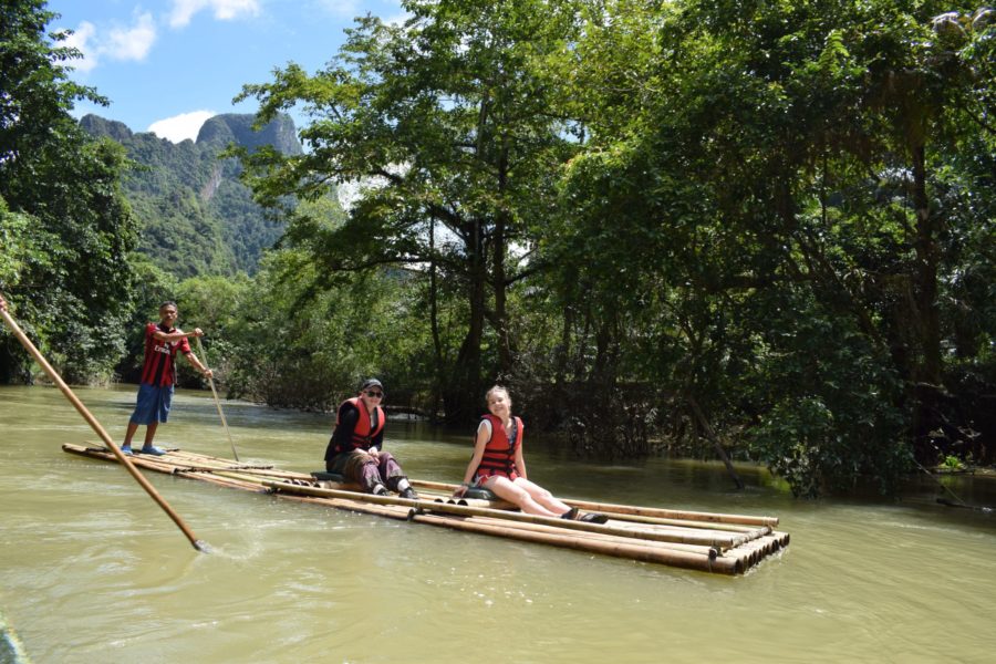 Photo of interns travelling along a river by raft