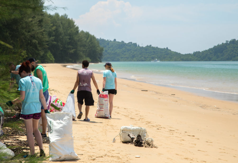 Photo of interns litter picking on a Thai beach