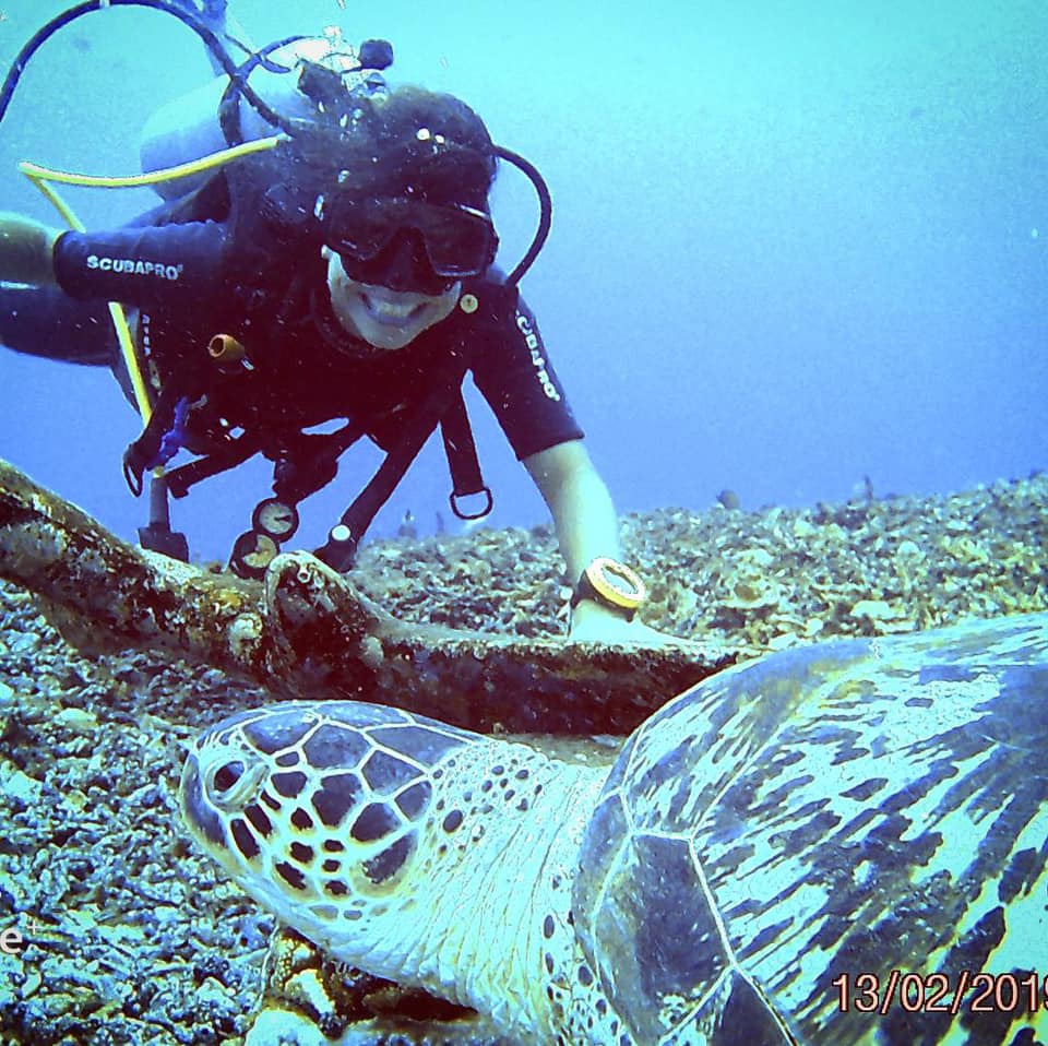 Nathalie Gil in Bali during her first scuba dive, which awakened her deep connection with the ocean and sparked her passion for marine conservation.
