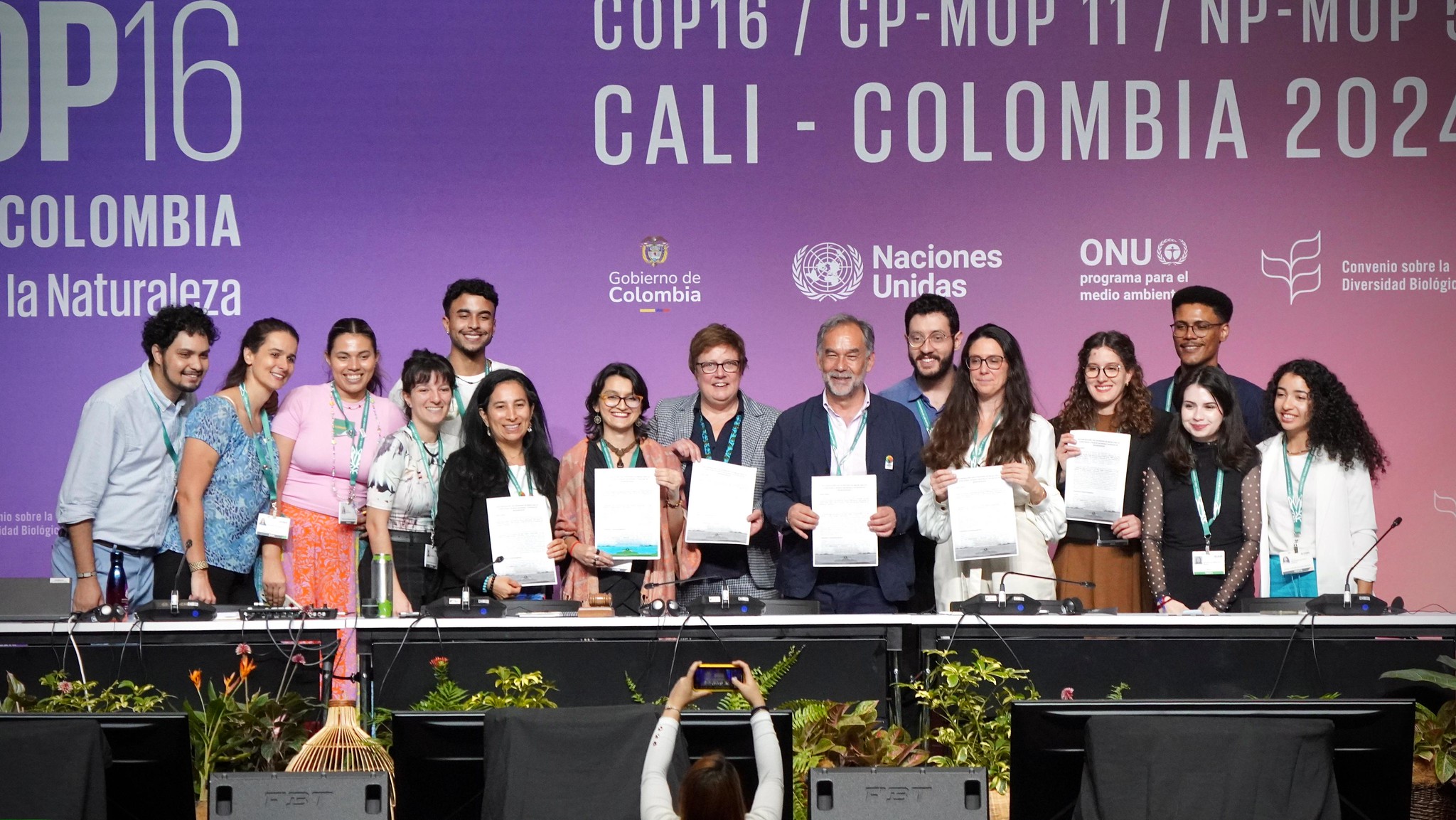 A group of conservationists at a United Nations Biodiversity Conference. In today's world, many professionals have figured out how to work abroad in conservation.
