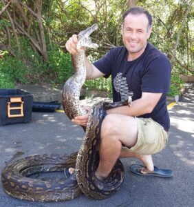 ick Evans with a rescued Southern African python. Nick has helped shift public perceptions of snakes from fear and misunderstanding toward appreciation